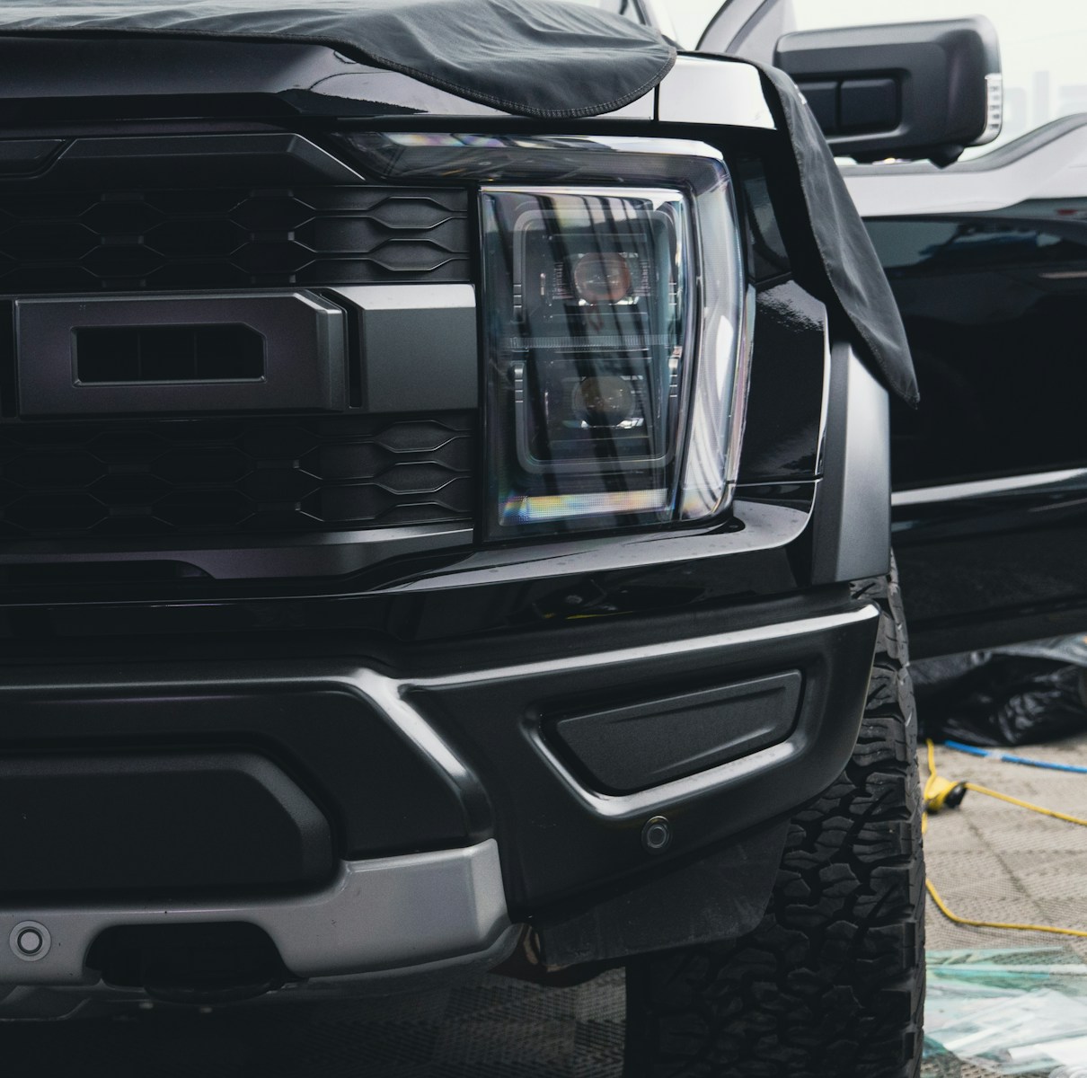 a close up of a truck's grille and bumper